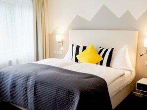 Sengetøy av topp kvalitet, safe på rommet og individuelt dekorert