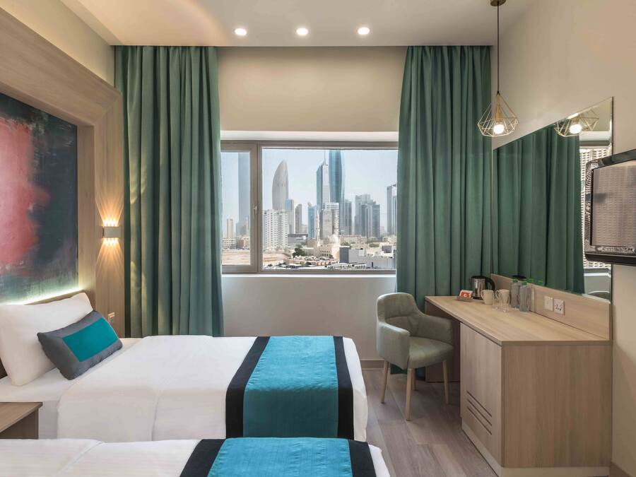 Premium bedding, desk, blackout curtains, rollaway beds