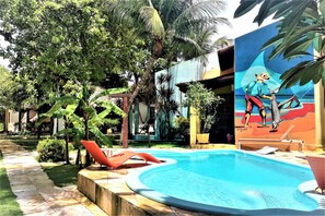 Outdoor pool, open 9:30 AM to 7:30 PM, pool loungers