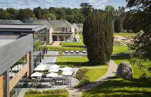 Deluxe Double or Twin Room | Outdoor dining | 3 restaurants, breakfast served