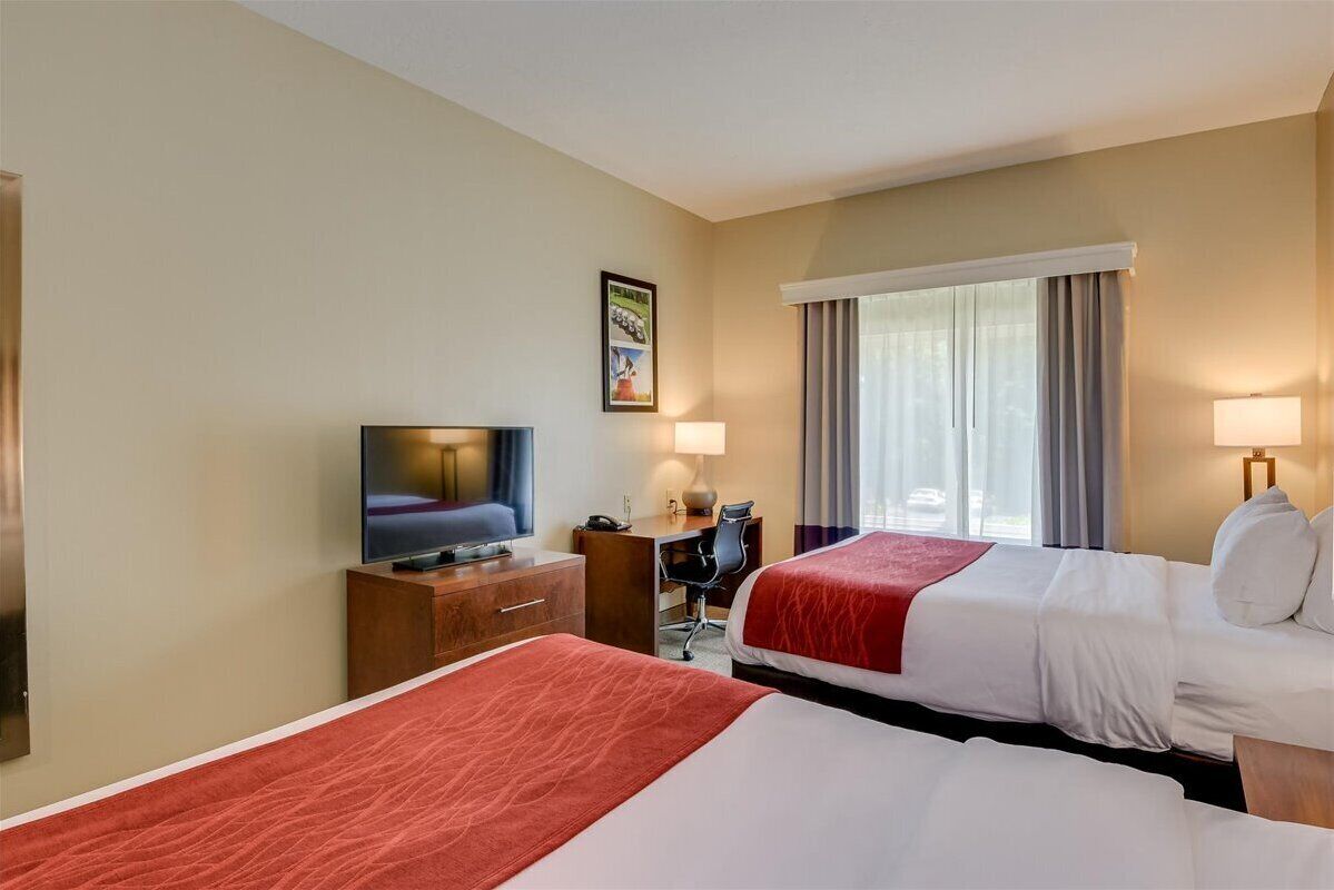 room, 2 queen beds, non smoking | laptop workspace, iron/ironing board, free wifi, bed sheets