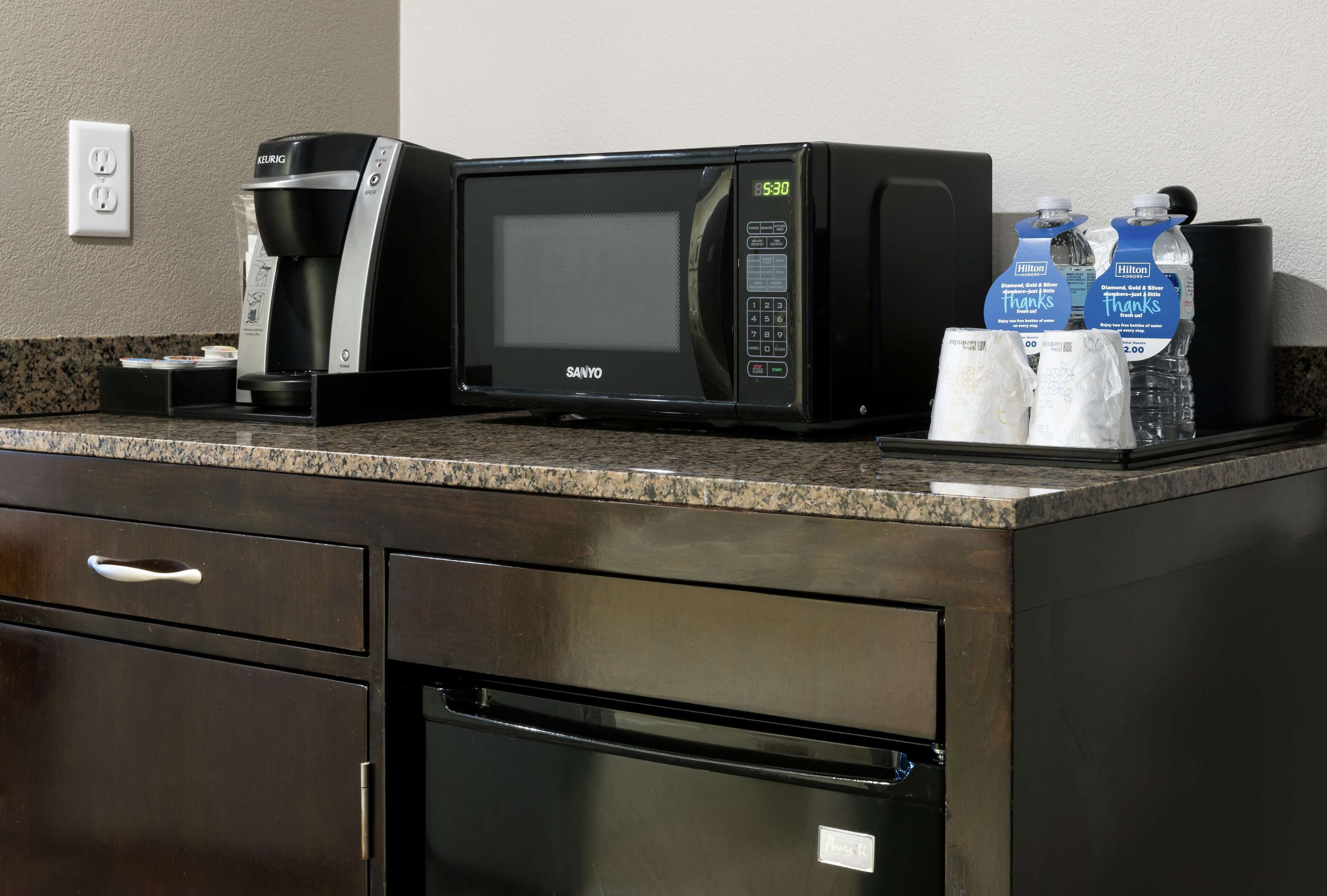 premium bedding, desk, blackout curtains, iron/ironing board