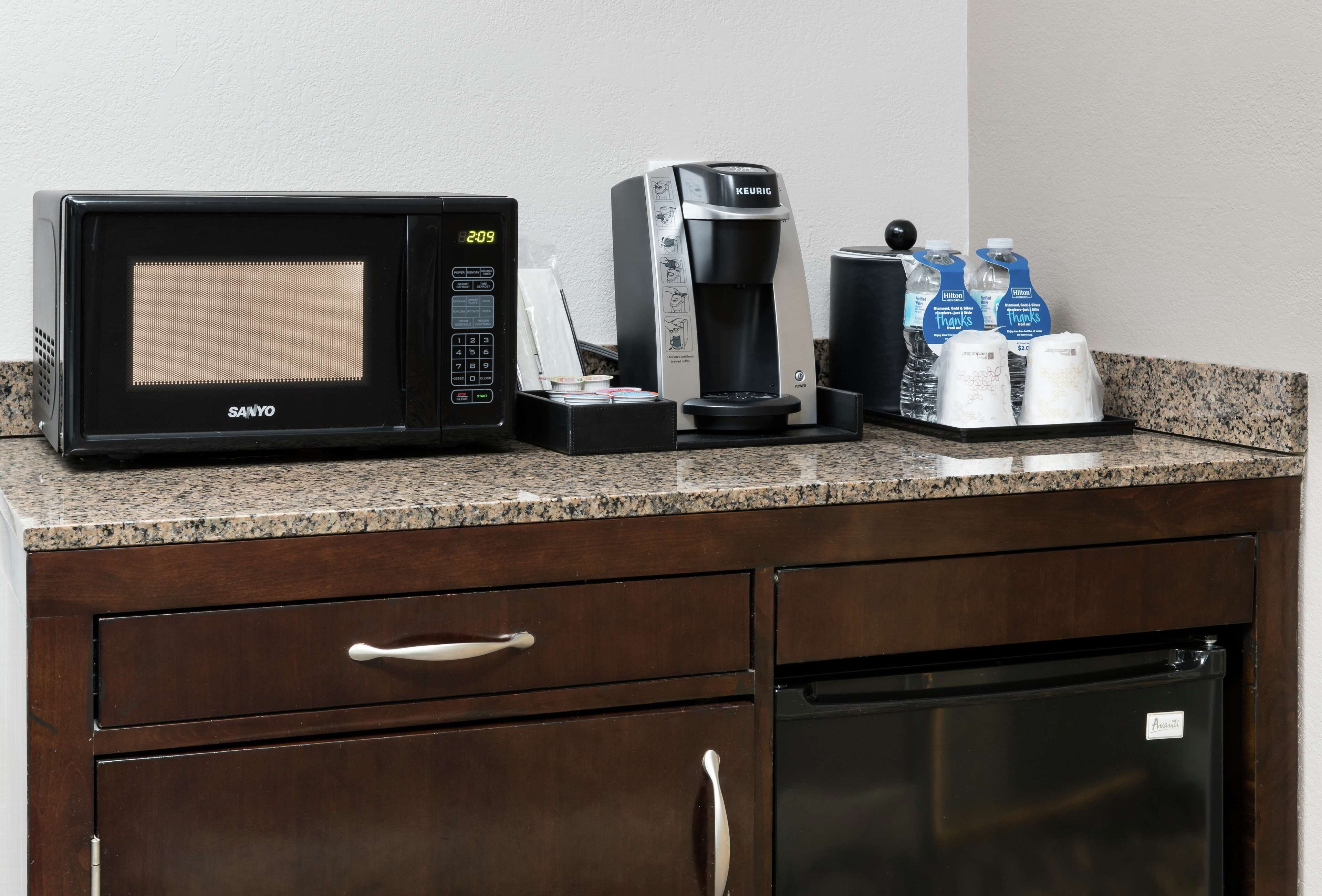 premium bedding, desk, blackout curtains, iron/ironing board