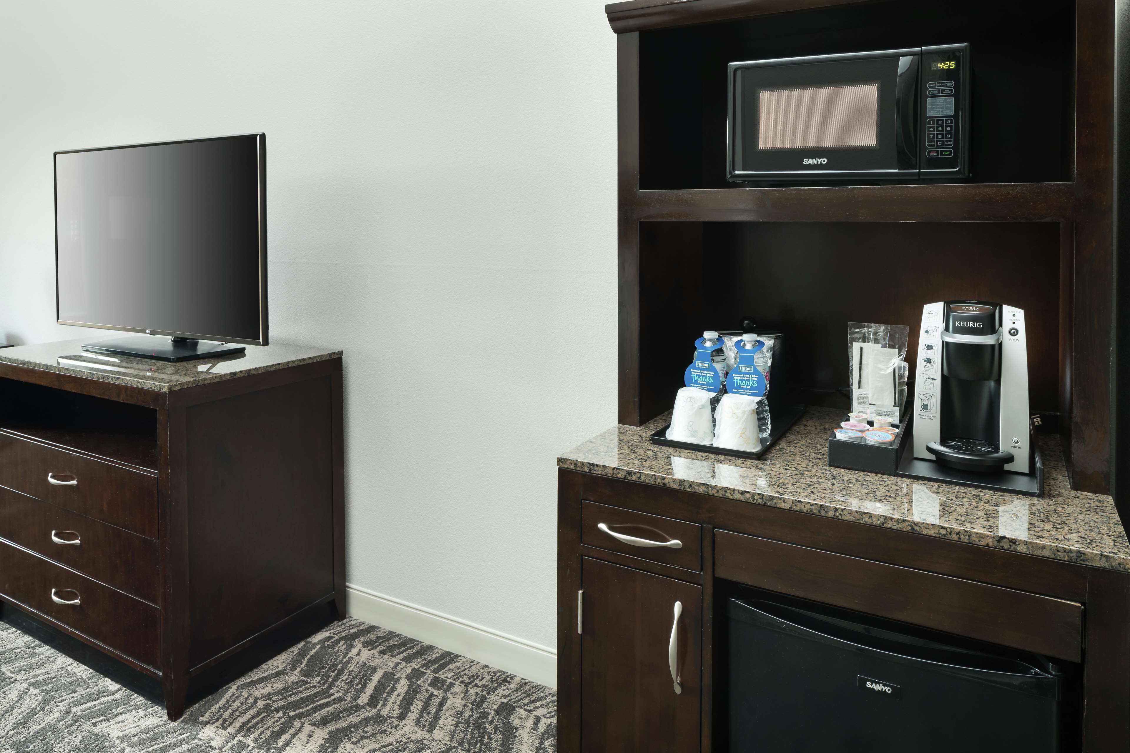 premium bedding, desk, blackout curtains, iron/ironing board