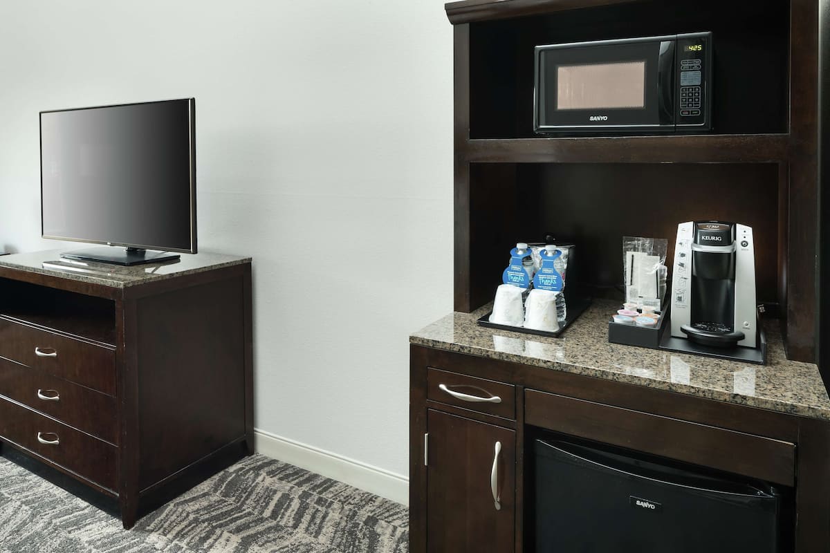 premium bedding, desk, blackout curtains, iron/ironing board