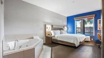 Suite, 1 cama King size, hidromasaje | Sábanas de algodón egipcio, ropa de cama de alta calidad y edredón
