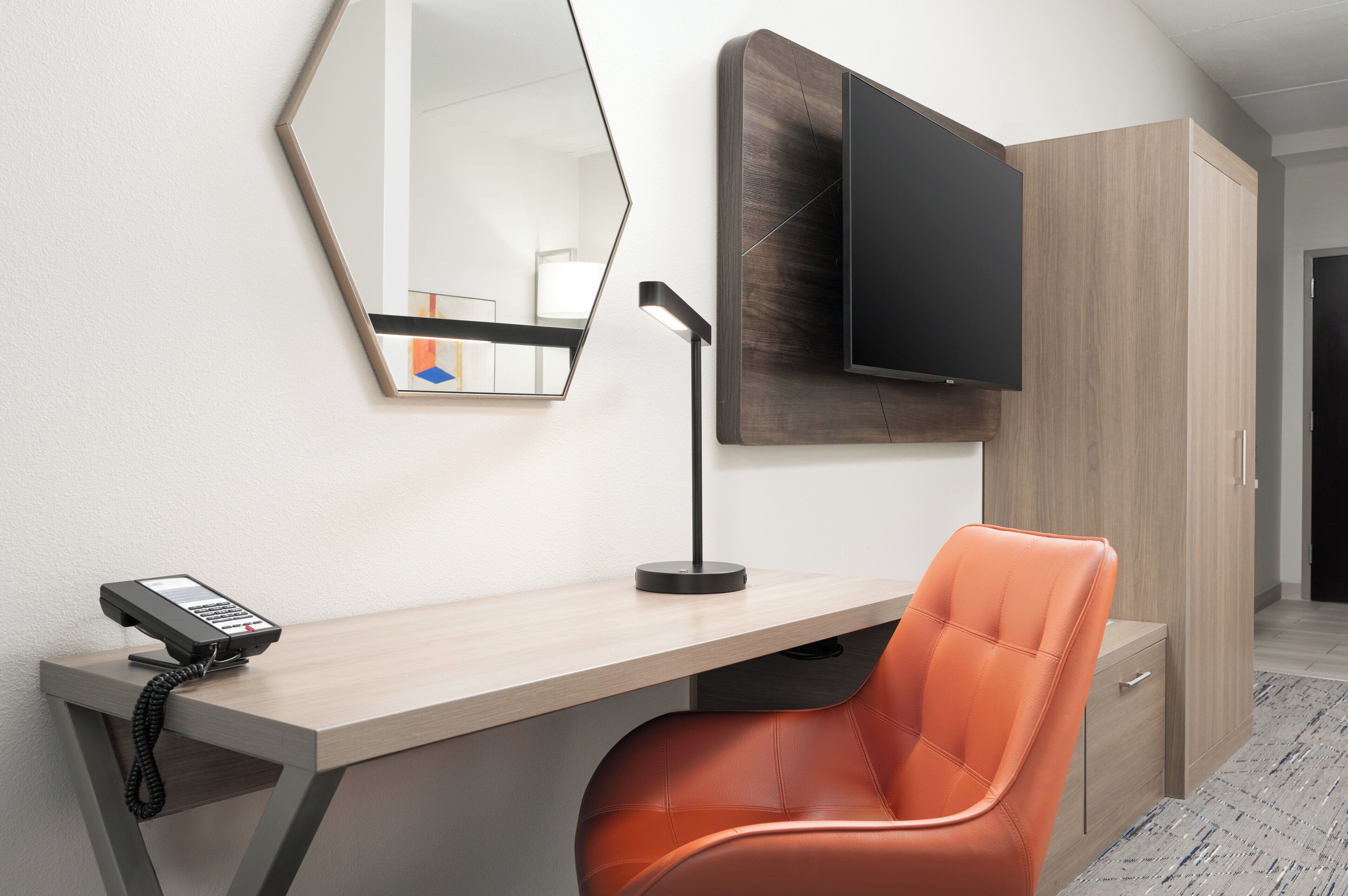 desk, blackout curtains, iron/ironing board, free cots/infant beds