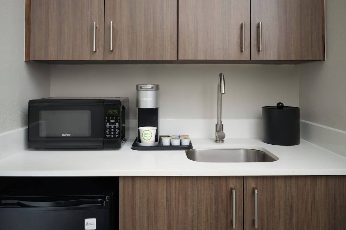 in-room safe, desk, blackout curtains, iron/ironing board