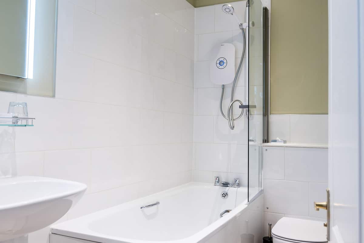 superior double room | bathroom | free toiletries, hair dryer, towels