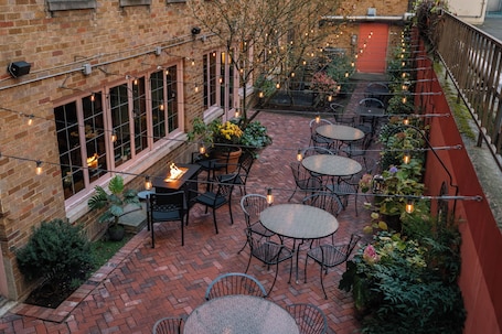 Outdoor dining. The Inn at Virginia Mason