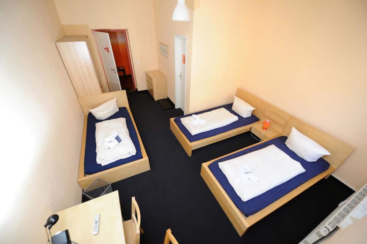 Triple Room, Shared Bathroom | Desk, iron/ironing board (on request), cribs (free)