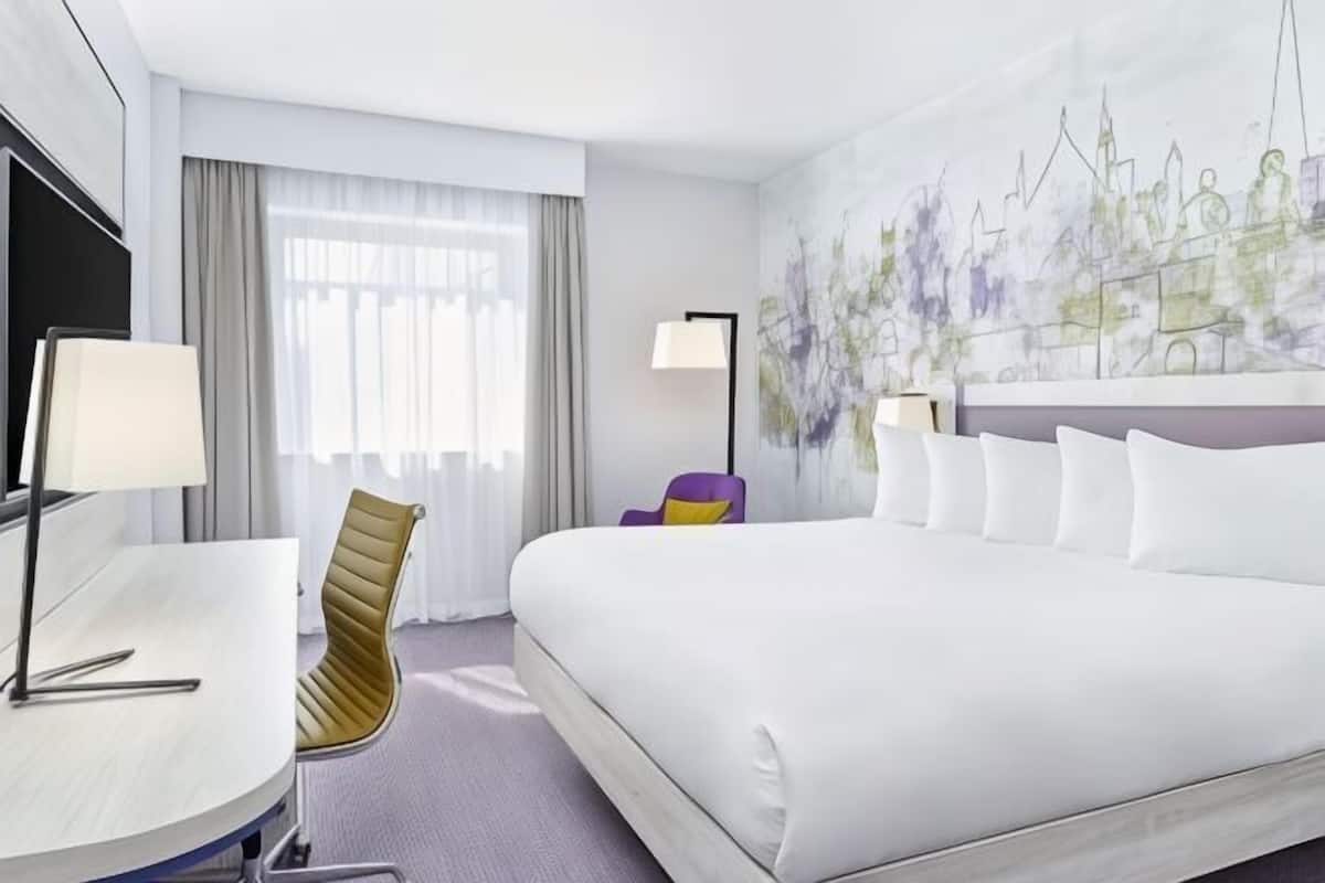 Hypo-allergenic bedding available, in-room safe, desk
