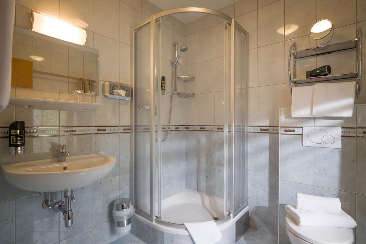 shower, free toiletries, hair dryer, bathrobes