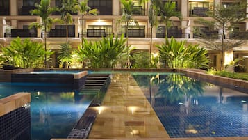 Outdoor pool, pool umbrellas, sun loungers