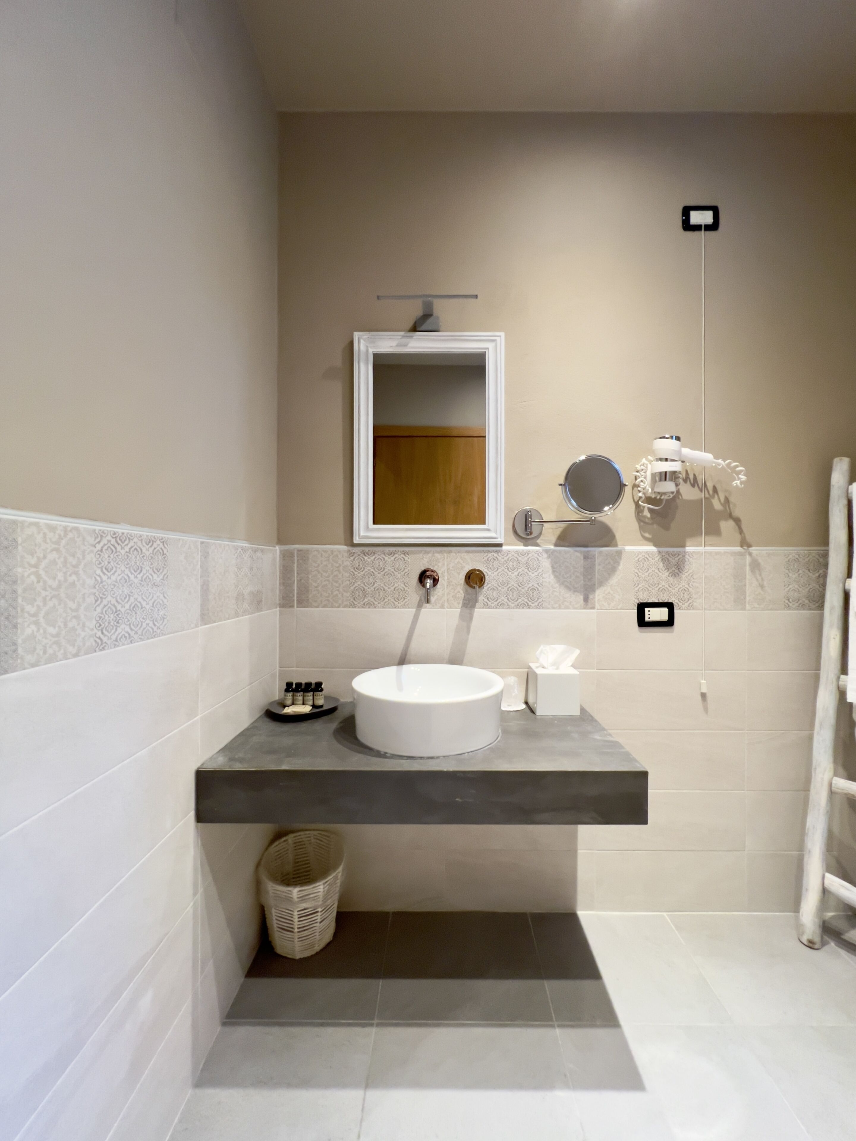 family room | bathroom | shower, rainfall showerhead, designer toiletries, hair dryer