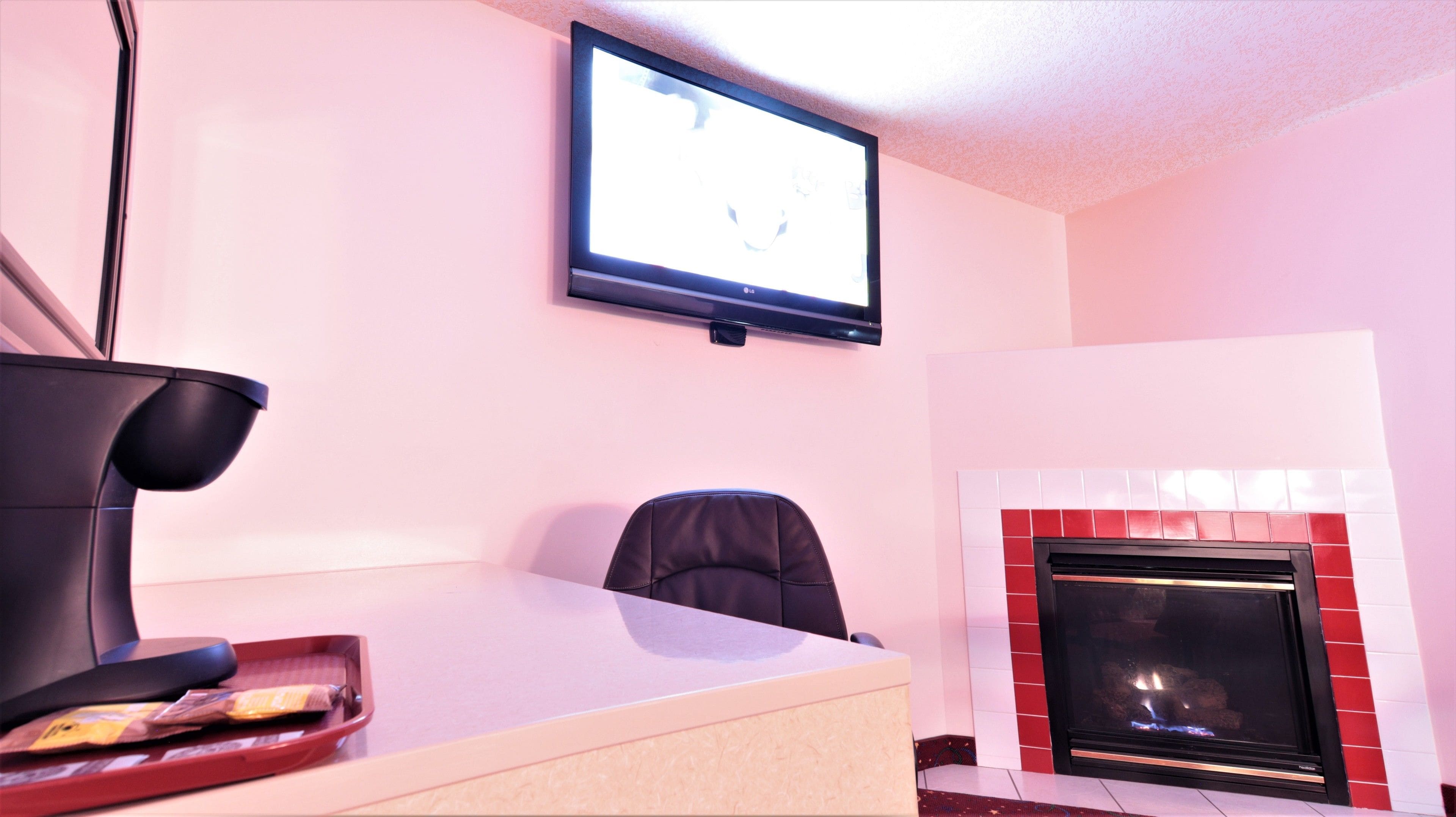 premium double room, 2 queen beds, fireplace | in-room business centre