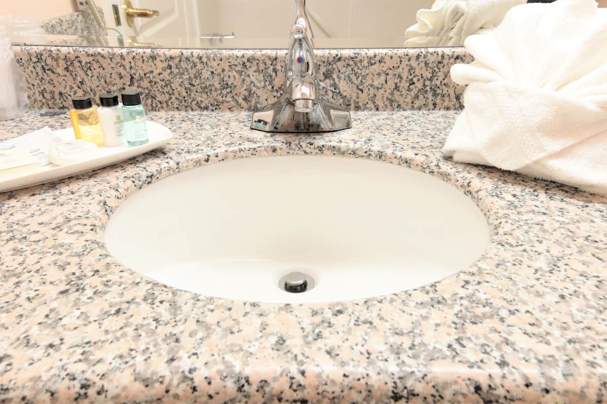 premium double room, 2 queen beds, fireplace | bathroom sink