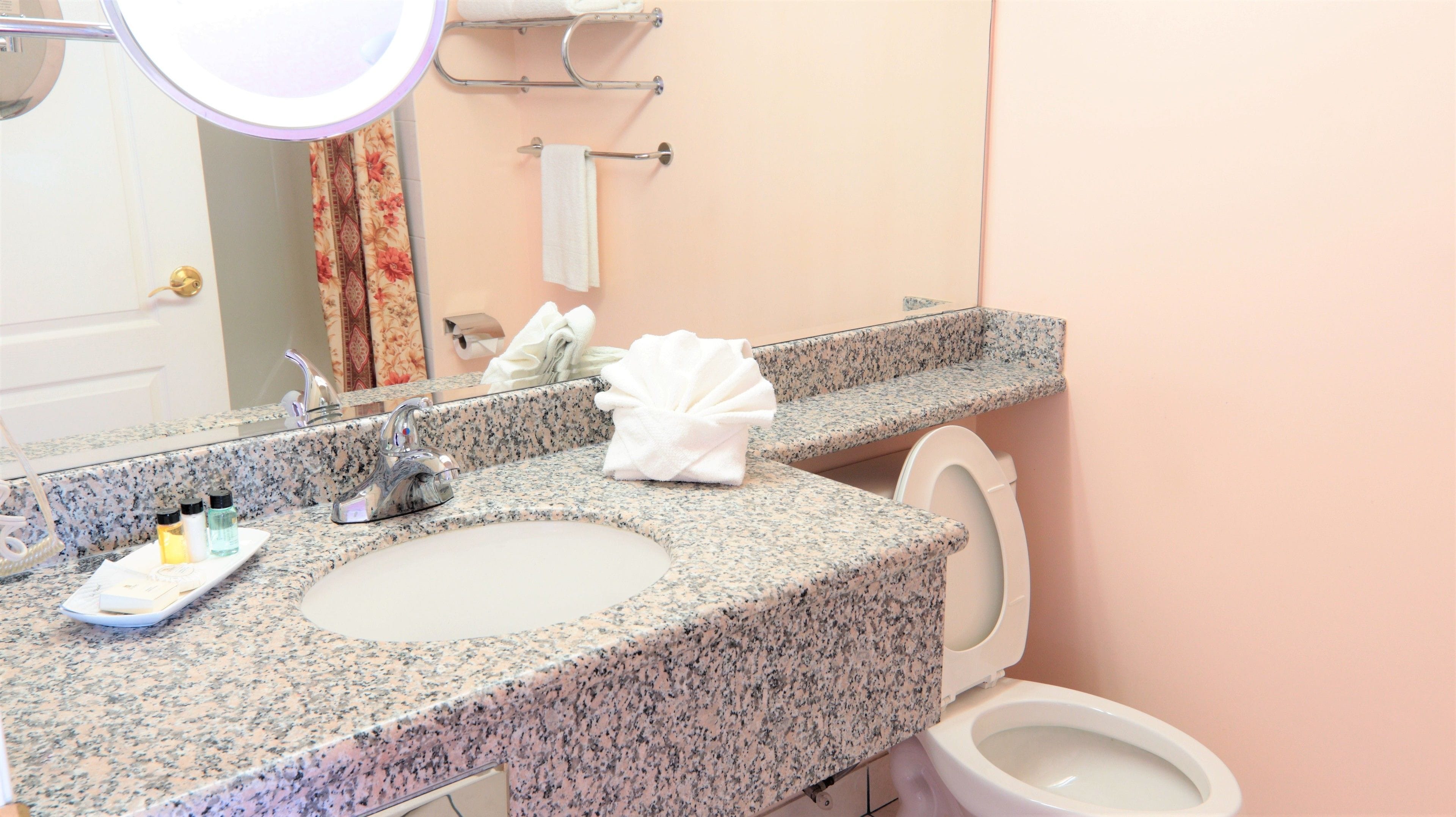 premium double room, 2 queen beds, fireplace | bathroom | combined shower/bathtub, deep-soaking bathtub, free toiletries