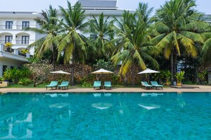 Outdoor pool, pool umbrellas, pool loungers