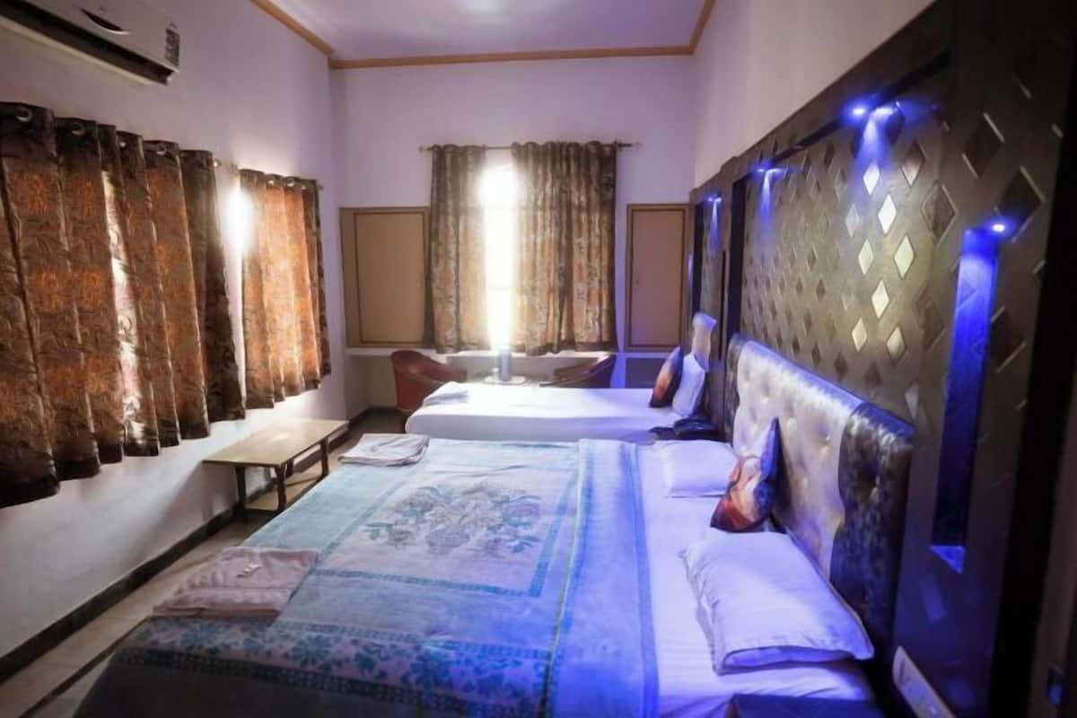 Pillowtop beds, desk, blackout drapes, individually decorated