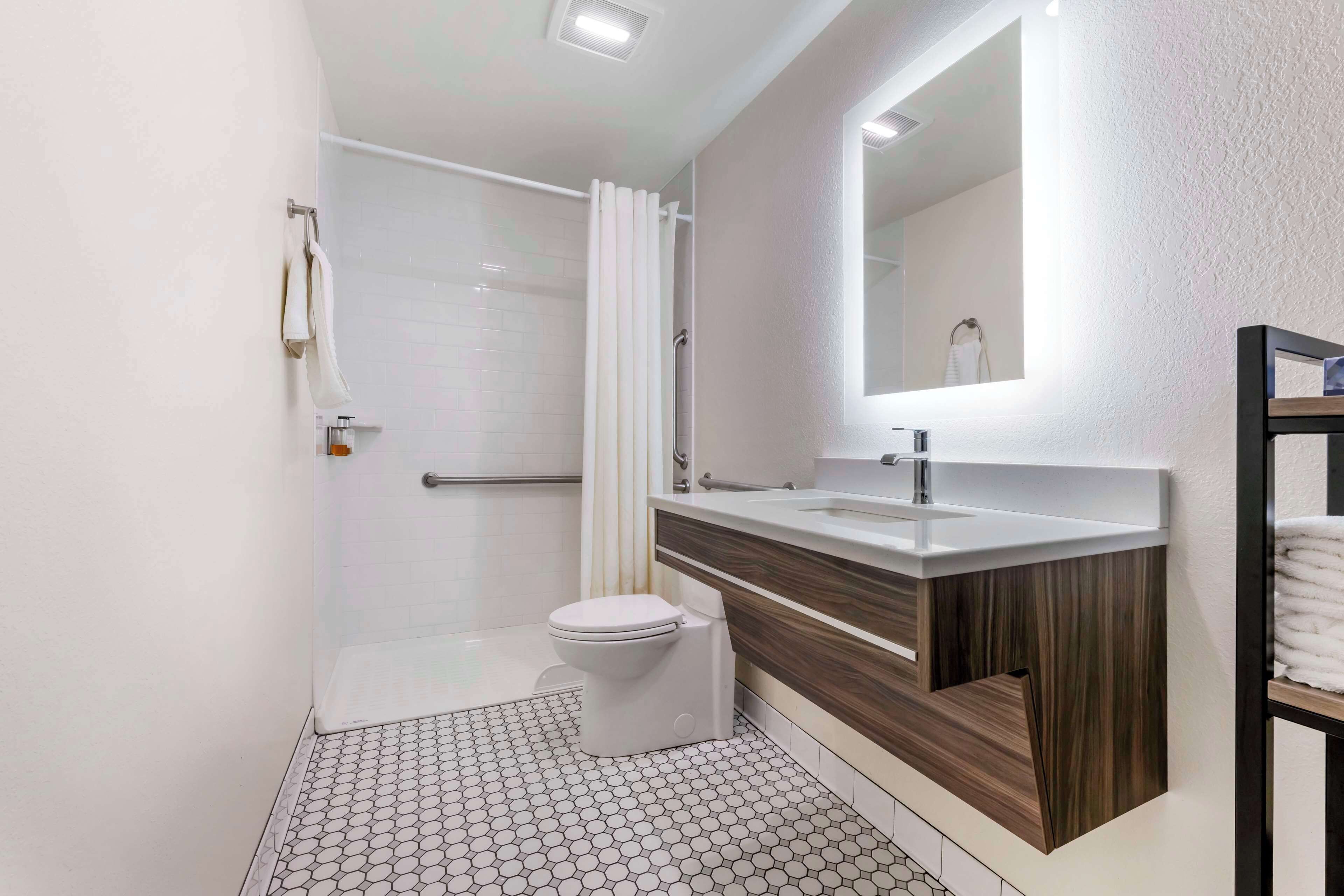 shower, hydromassage showerhead, designer toiletries, hair dryer