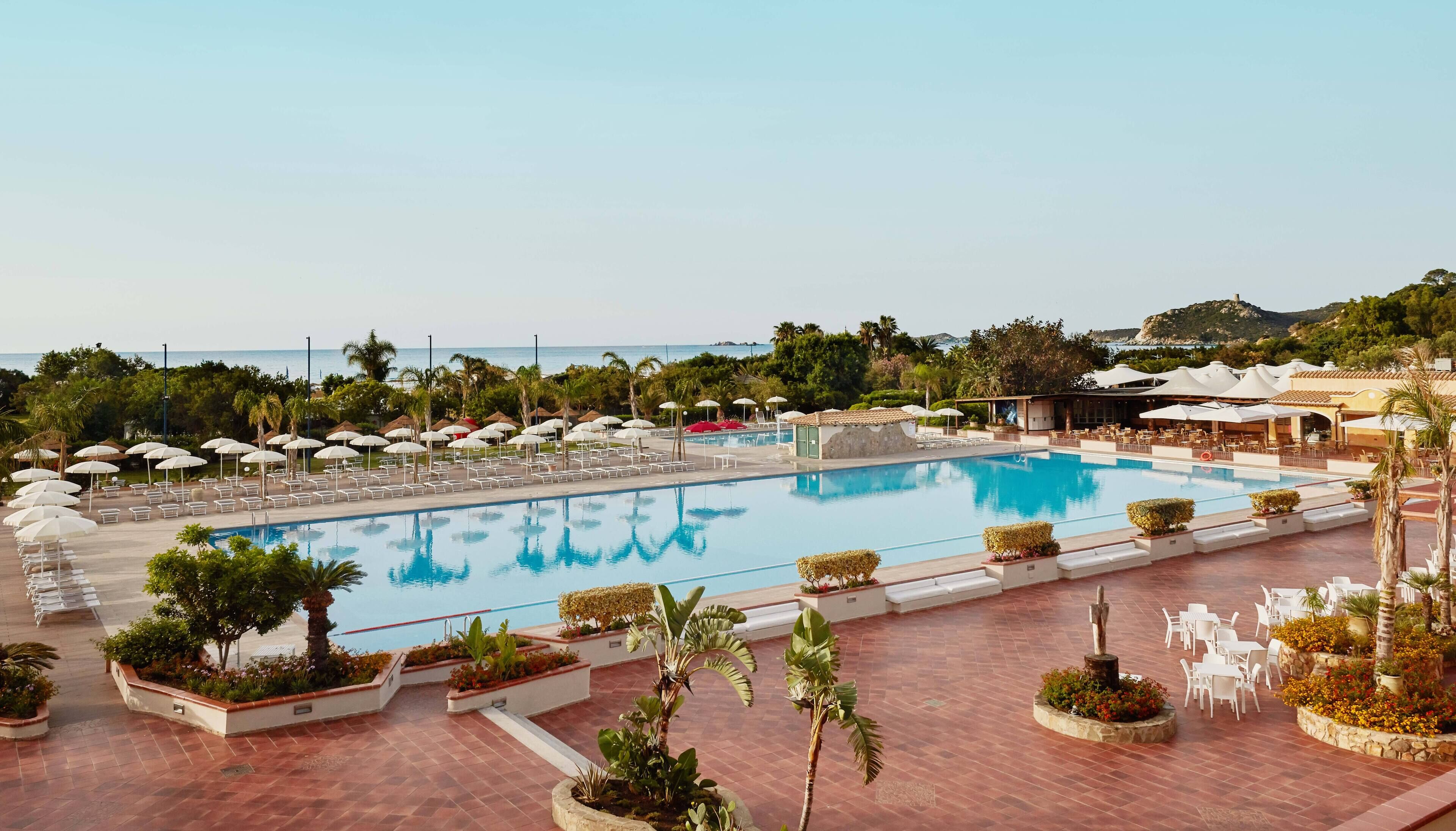 seasonal outdoor pool, pool umbrellas, pool loungers