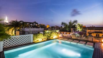 Indoor pool, outdoor pool, pool umbrellas, sun loungers