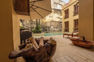 Indoor pool, outdoor pool, pool umbrellas, sun loungers