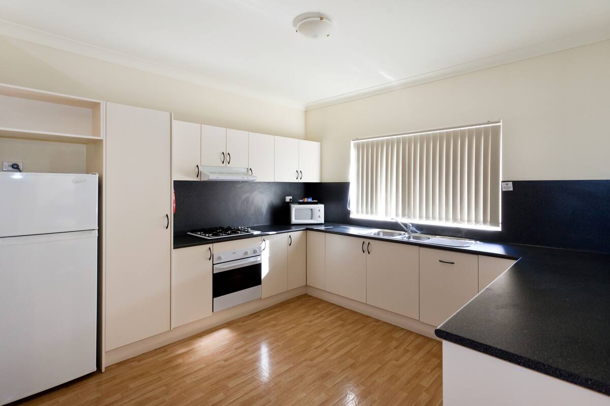 deluxe two-bedroom apartment - not pet friendly | private kitchen | fridge, microwave, stovetop, coffee/tea maker