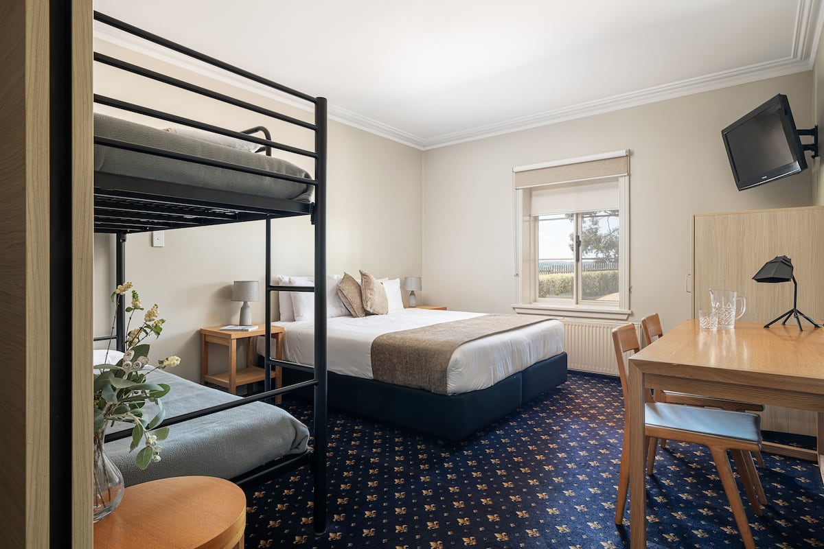 Sovereign Family Room | Iron/ironing board, bed sheets