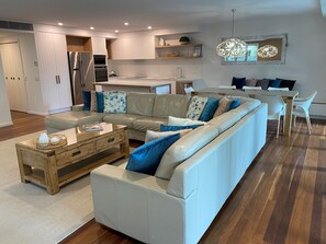 Belongil Penthouse Three Bedroom w Pool | Living area | 60-inch LCD TV with cable channels - East on Byron (Byron Bay)