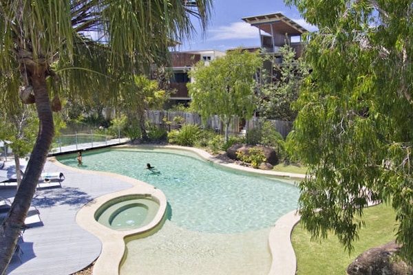 Outdoor pool, pool umbrellas, sun loungers
