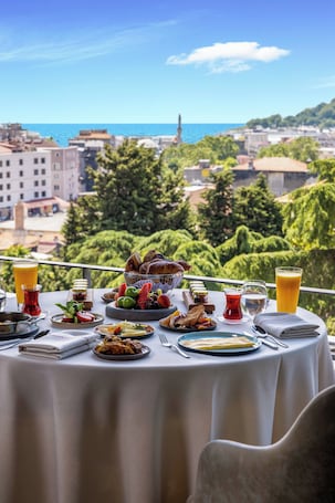 Restaurante. Tomtom Suites - Special Class