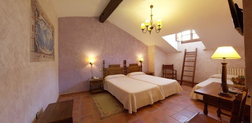 triple room | in-room safe, desk, blackout curtains, iron/ironing board