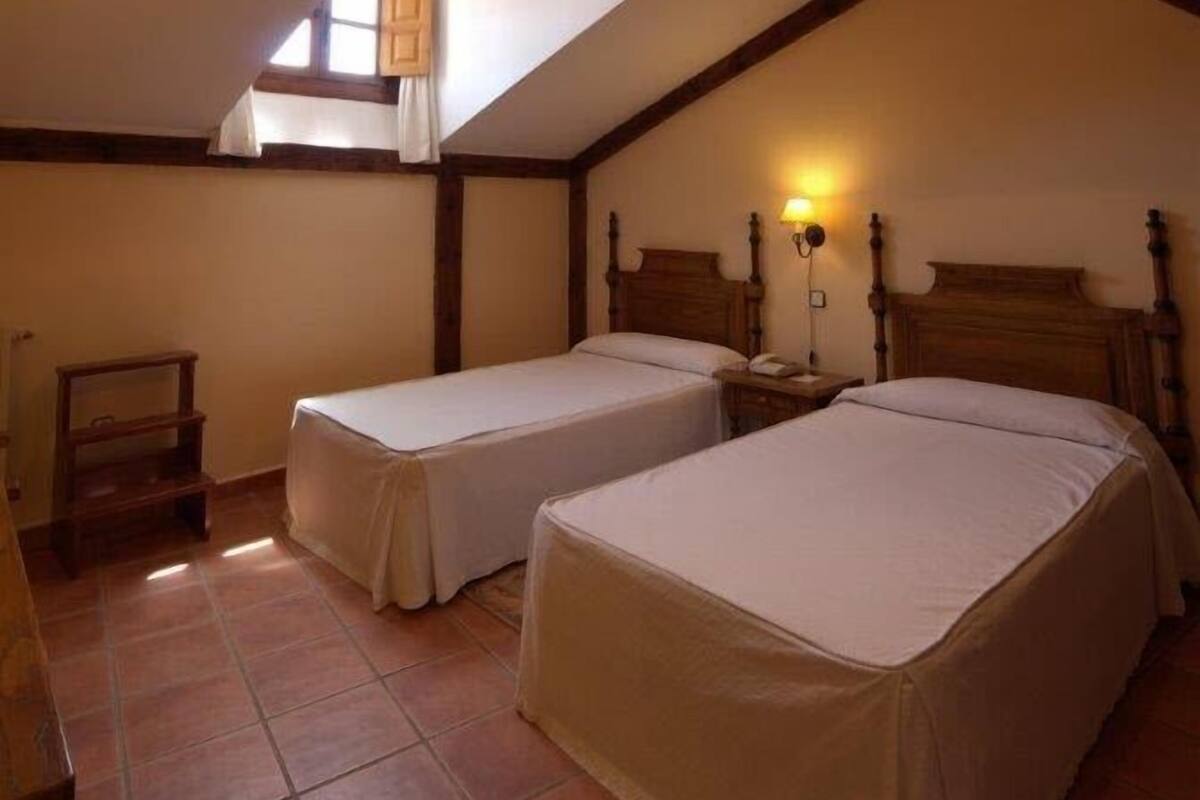 triple room | in-room safe, desk, blackout curtains, iron/ironing board