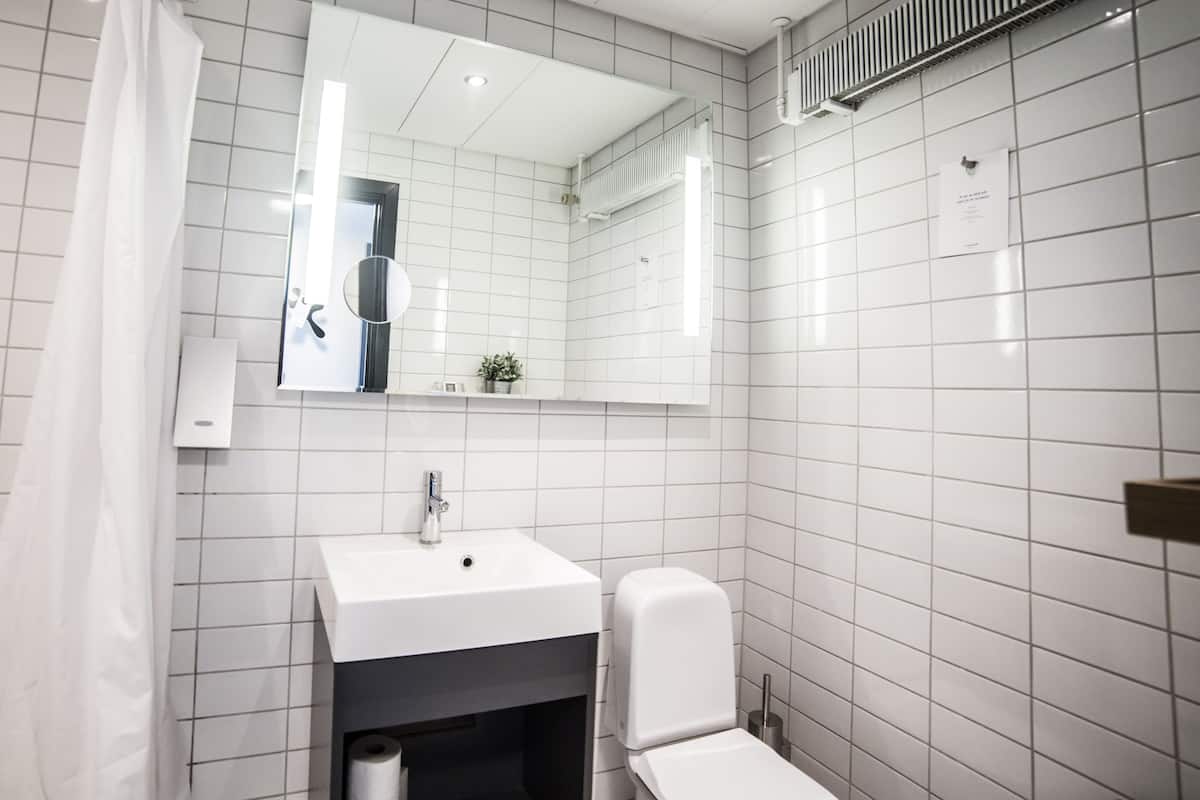 shower, eco-friendly toiletries, hair dryer, towels