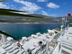Private beach, beach shuttle, sun loungers, beach towels
