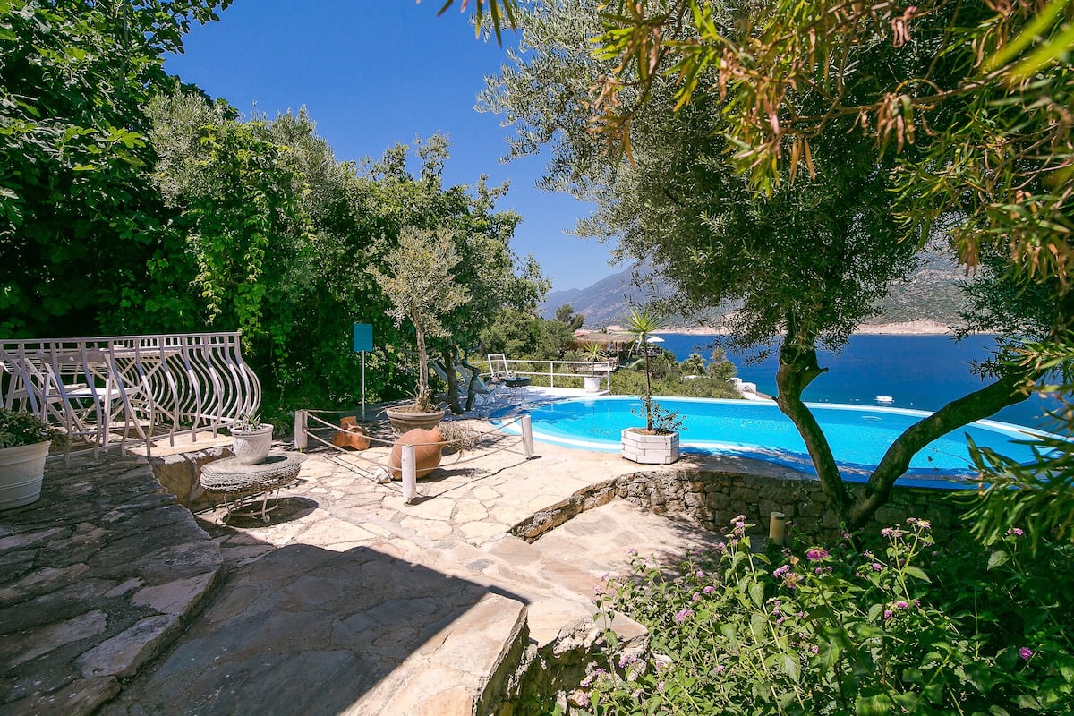 Bungalov Bahce ve Deniz Manzarali Oda | Jardín