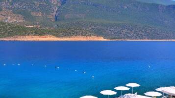 Private beach, beach shuttle, sun loungers, beach towels