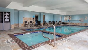A swimming pool with a no diving sign, lounge chairs, and a reception area. - Holiday Inn Express & Suites El Paso West by IHG (El Paso)
