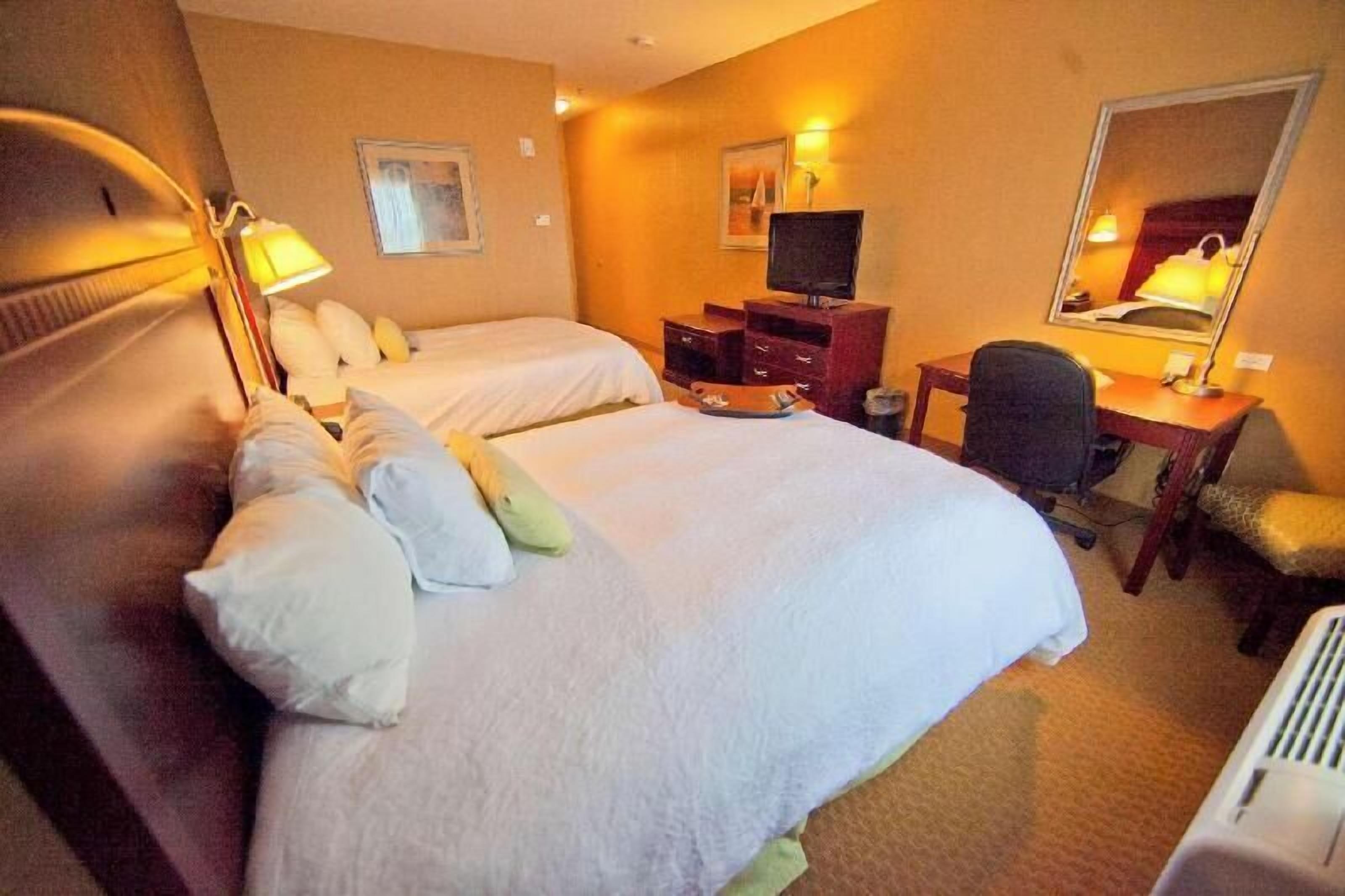 Pillowtop beds, desk, laptop workspace, blackout drapes