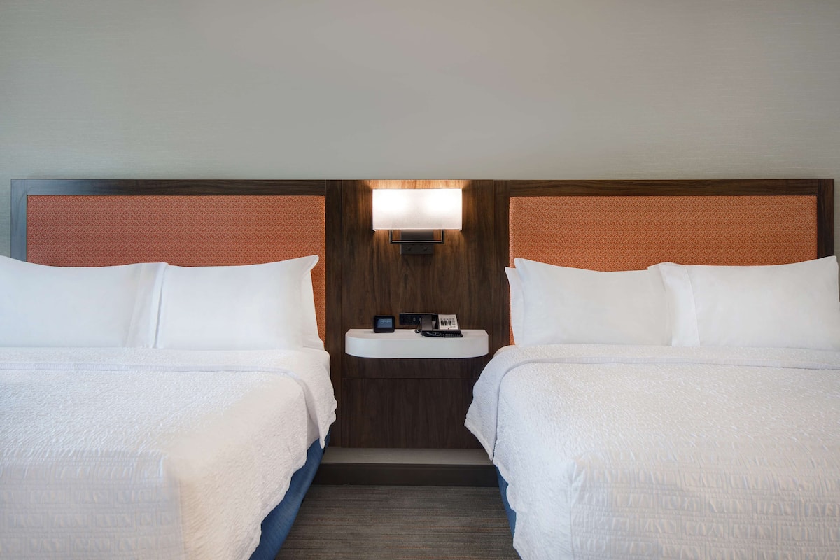 premium bedding, desk, laptop workspace, blackout curtains