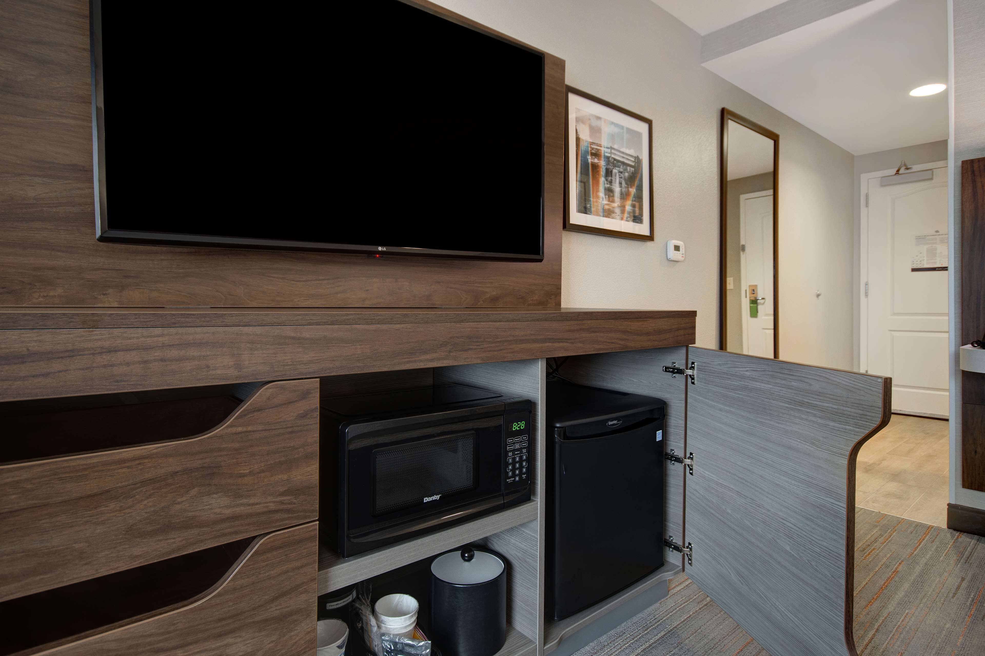 premium bedding, desk, laptop workspace, blackout curtains