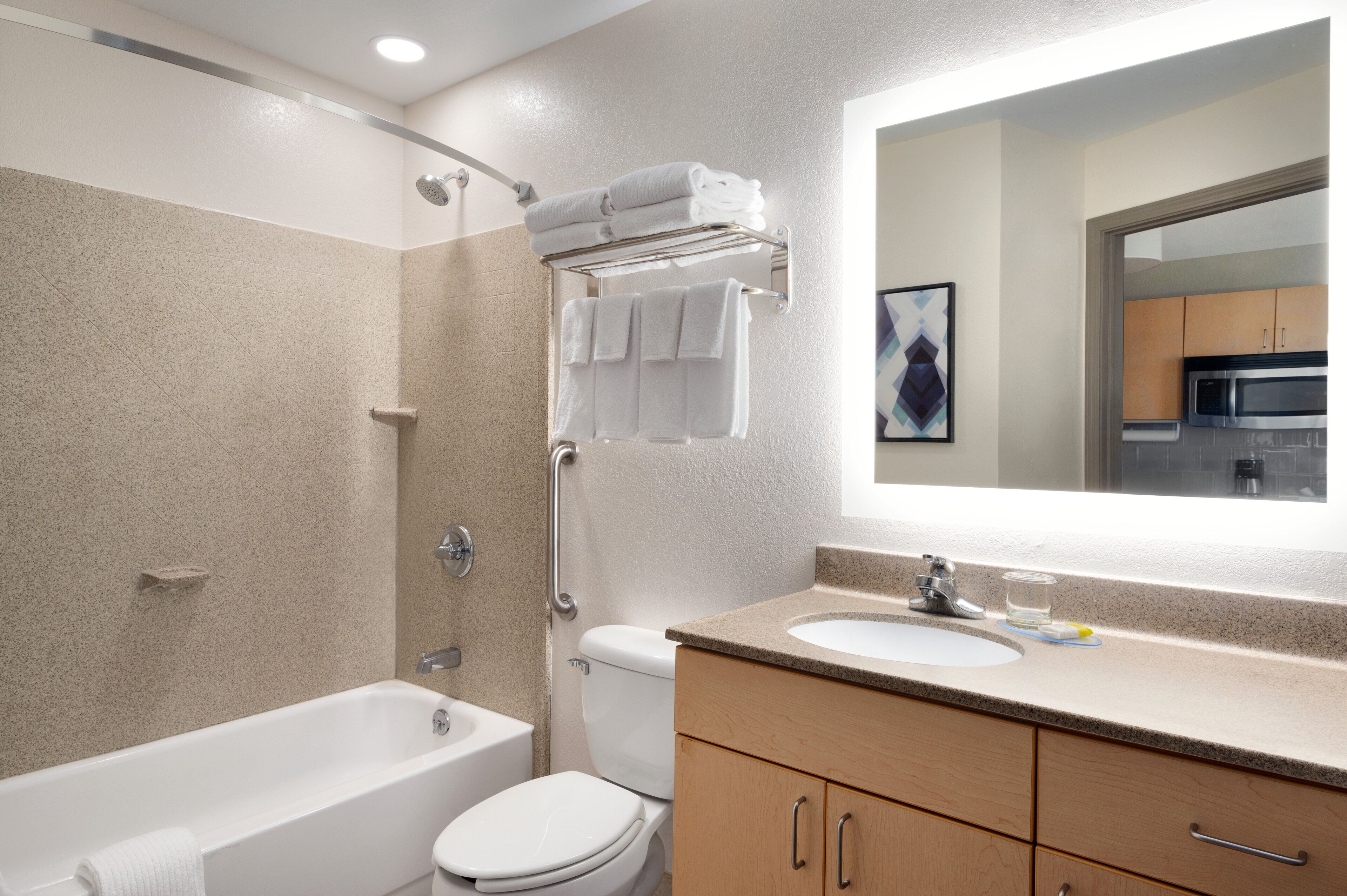 combined shower/bathtub, eco-friendly toiletries, hair dryer, towels