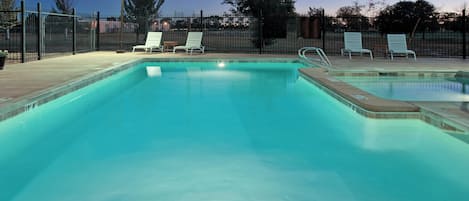 Outdoor pool, open 10:00 AM to 10:00 PM, pool loungers