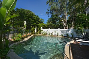 Outdoor pool, a heated pool, pool loungers