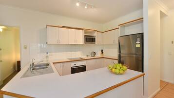 Apartemen, 3 kamar tidur, 2 kamar mandi | Dapur pribadi | Lemari es, microwave, oven, dan kompor