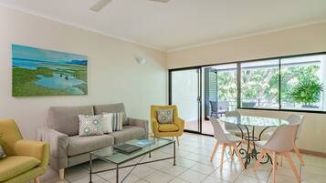 Room, 1 Bedroom, Jetted Tub | Living area | DVD player