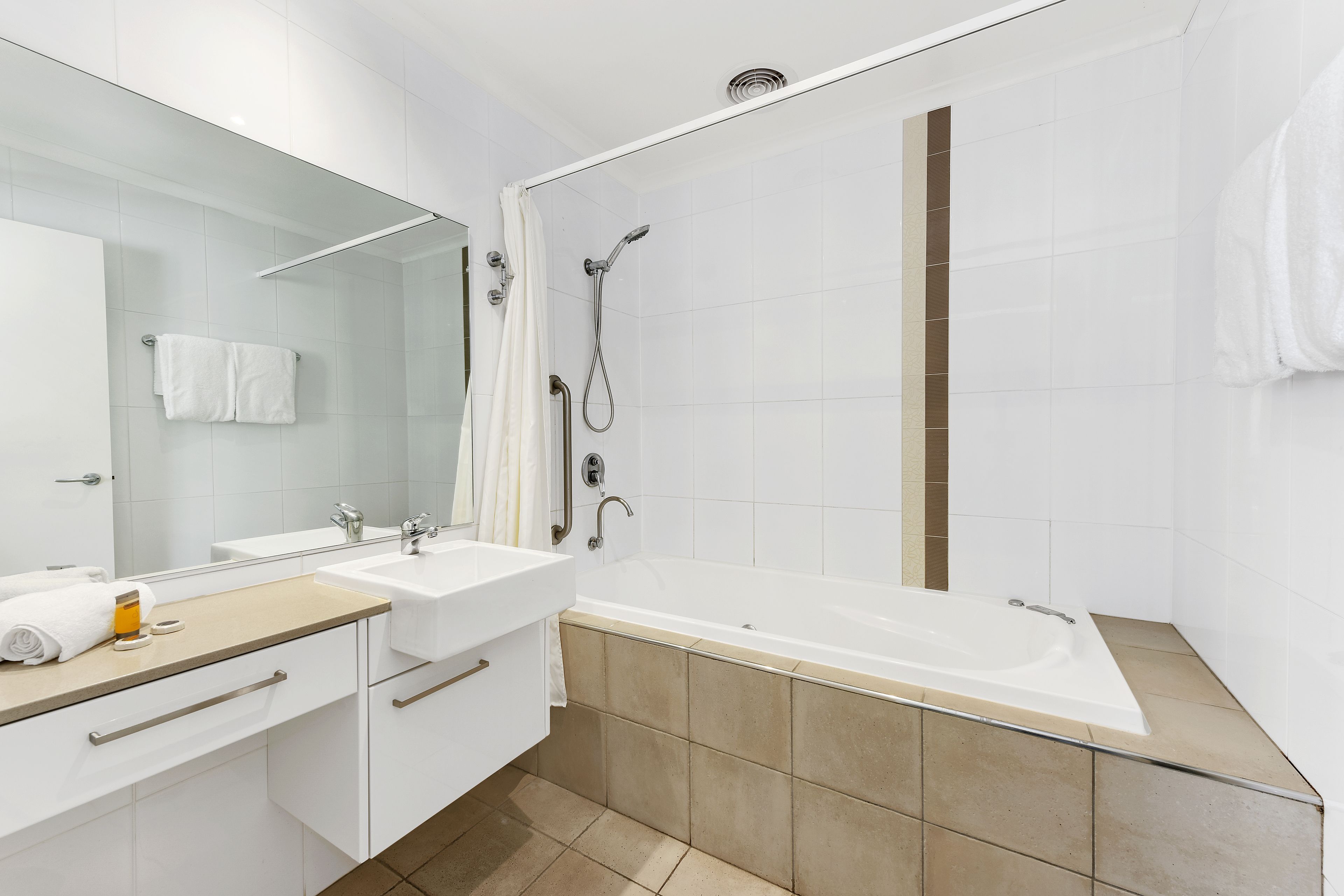 Premier Apartment, 2 Bedrooms | Bathroom | Combined shower/bathtub, hair dryer, towels