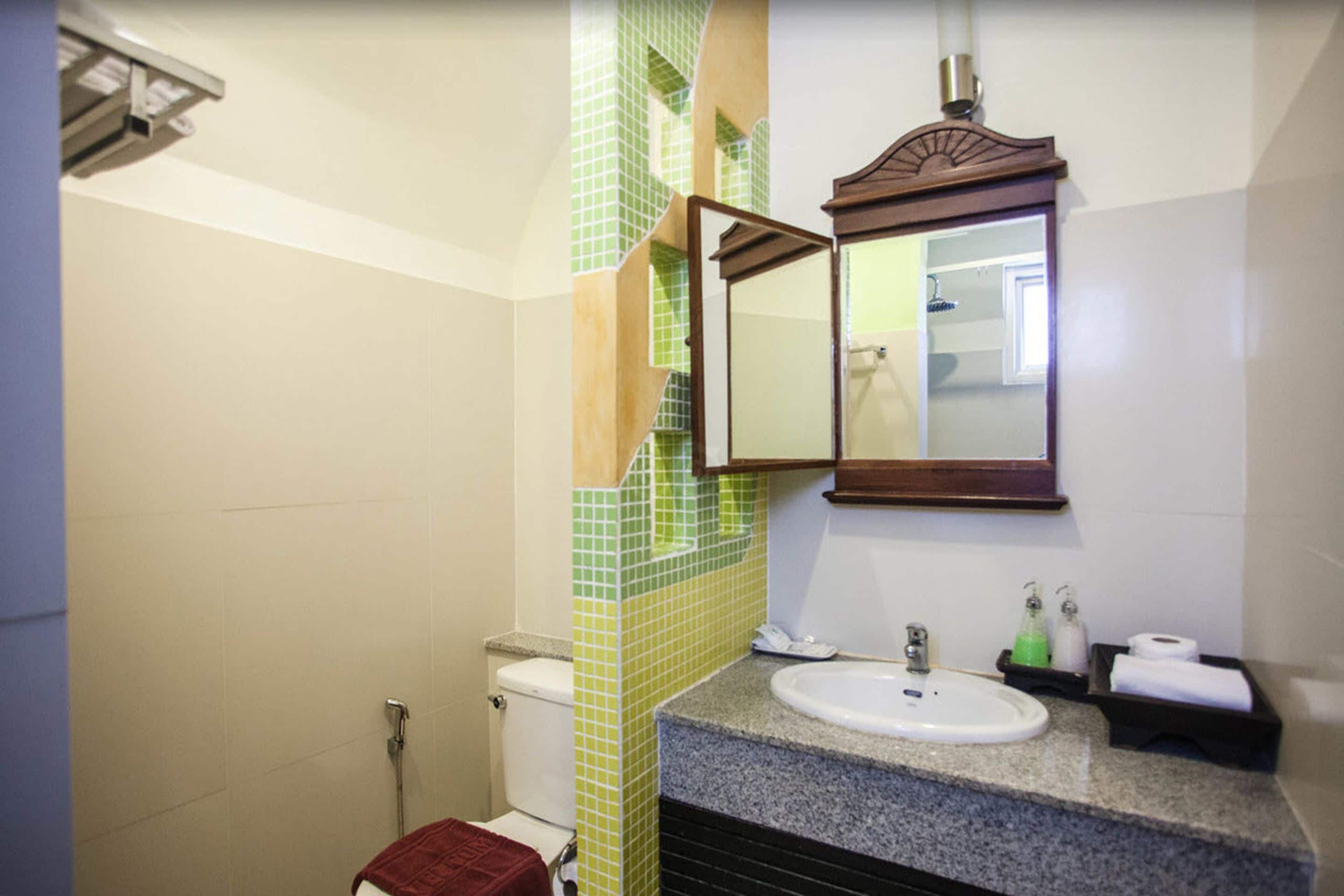 deluxe room | bathroom | shower, hair dryer, bathrobes, slippers
